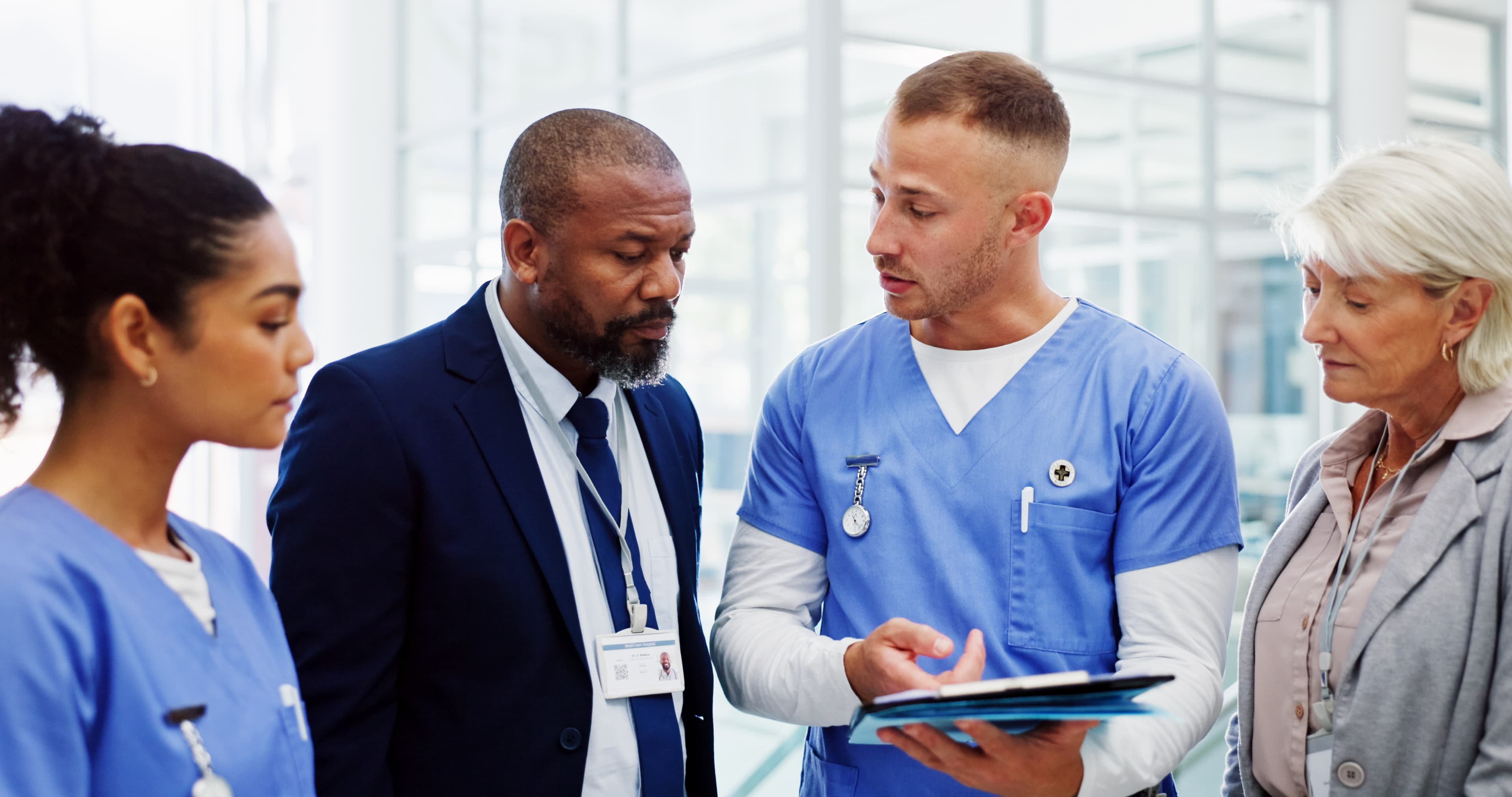 Shift leader discussing assignments with RT staff